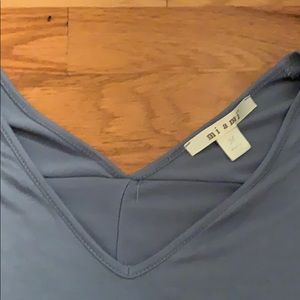 Francesca’s baby blue V neck top